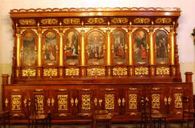 A series of Images in choir stalls of the chancel